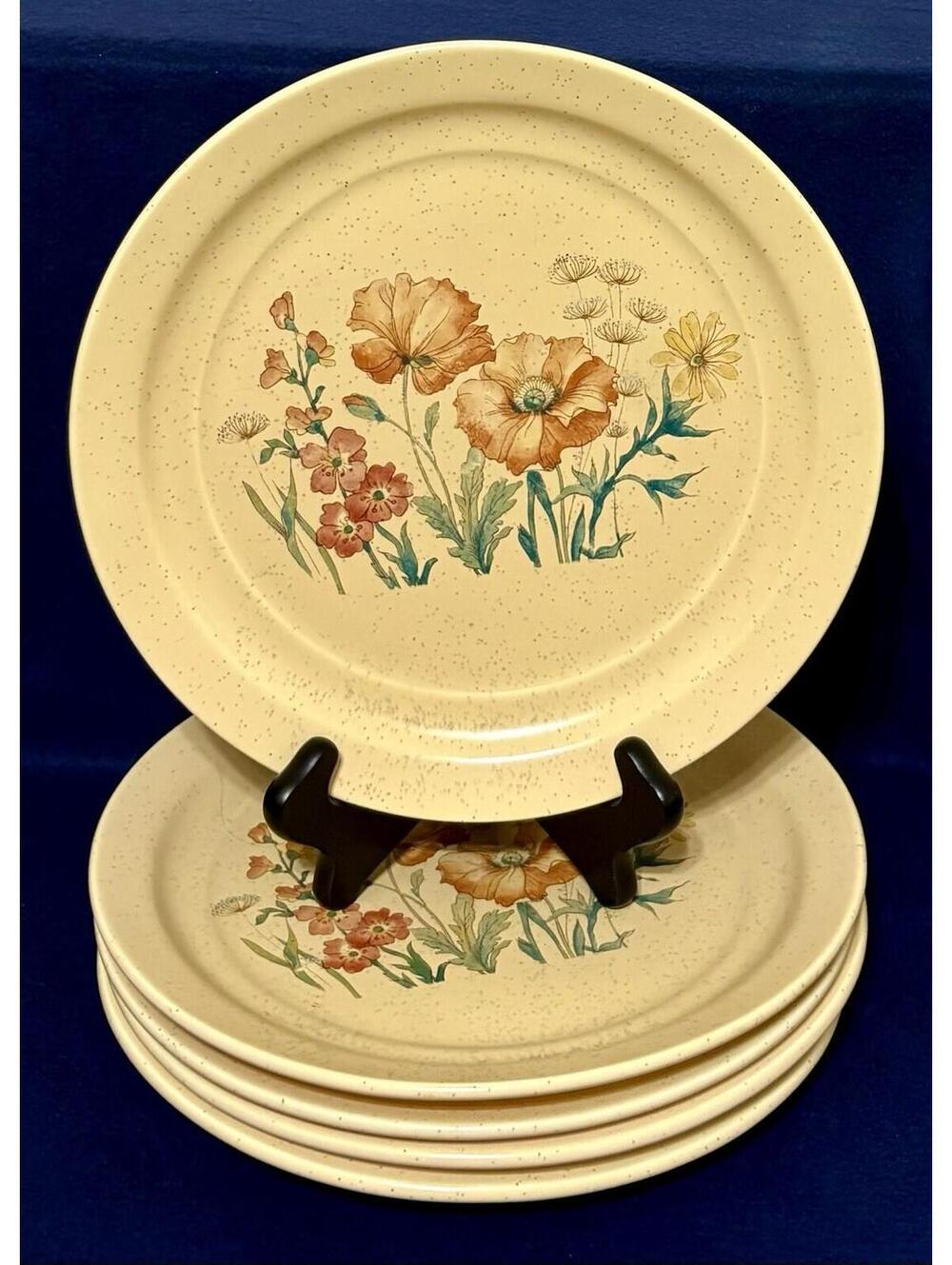 Set Of 5 vintage Treasure Craft pottery dinner plates "Wildflower" pattern.